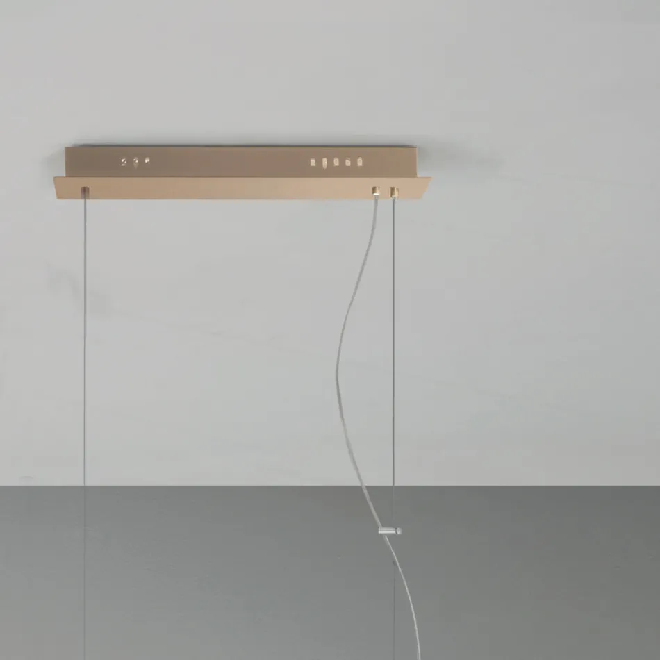 Pendelleuchte aus goldfarben lackiertem Metall und mundgeblasenem Glas - Birga Viadurini