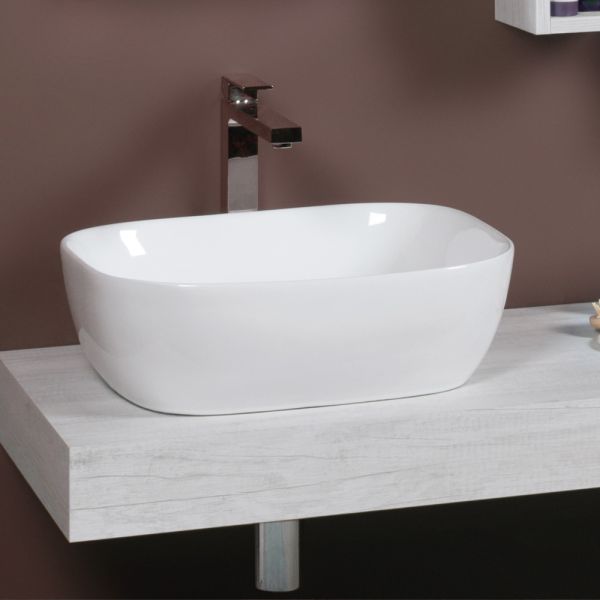 Modernes design: weißes keramik-waschbecken mit geneigter arbeitsplatte – papavero