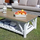 Lounge im Freien mit Couchtisch aus Mangoholz und Polycotton-Kissen - Orlanda Viadurini