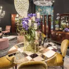 Runder Tisch Modeno mit Glasplatte und Holzeinlagen Ozzy Viadurini